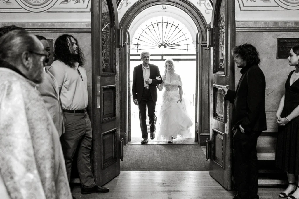 Father and bride walking down 
 Wedding Photography at St. Nicholas Russian Orthodox Cathedral