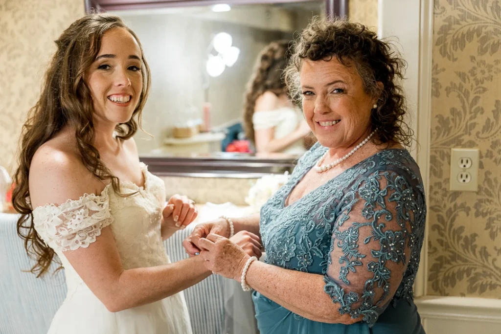 Bride and Mom getting dressed at the Smithville Inn Wedding photography