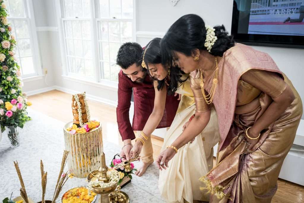 Shared Rituals: The family comes together to perform a ritual, showcasing the unity and cultural heritage that defines the ceremony.