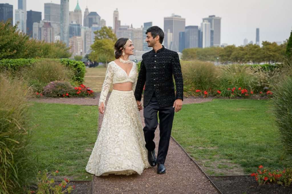 08-wedding-couple-walking-liberty-house-nj