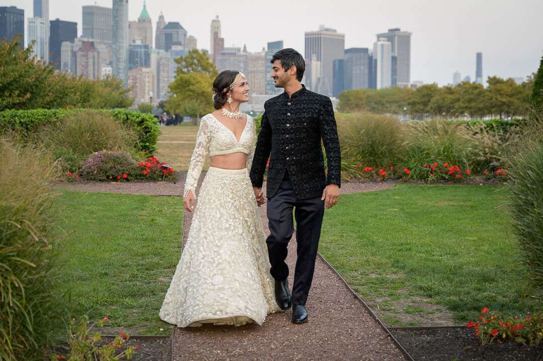 bride-groom-walking-towards-nyc-skyline