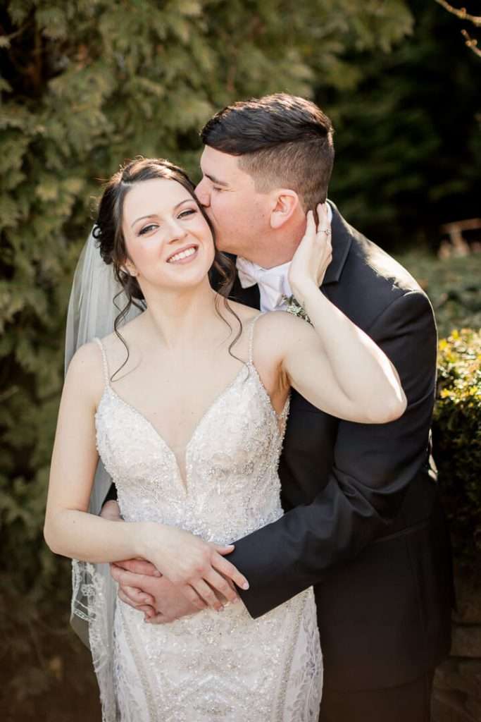 Close-up of bride and groom smiling on their wedding day at Park Savoy