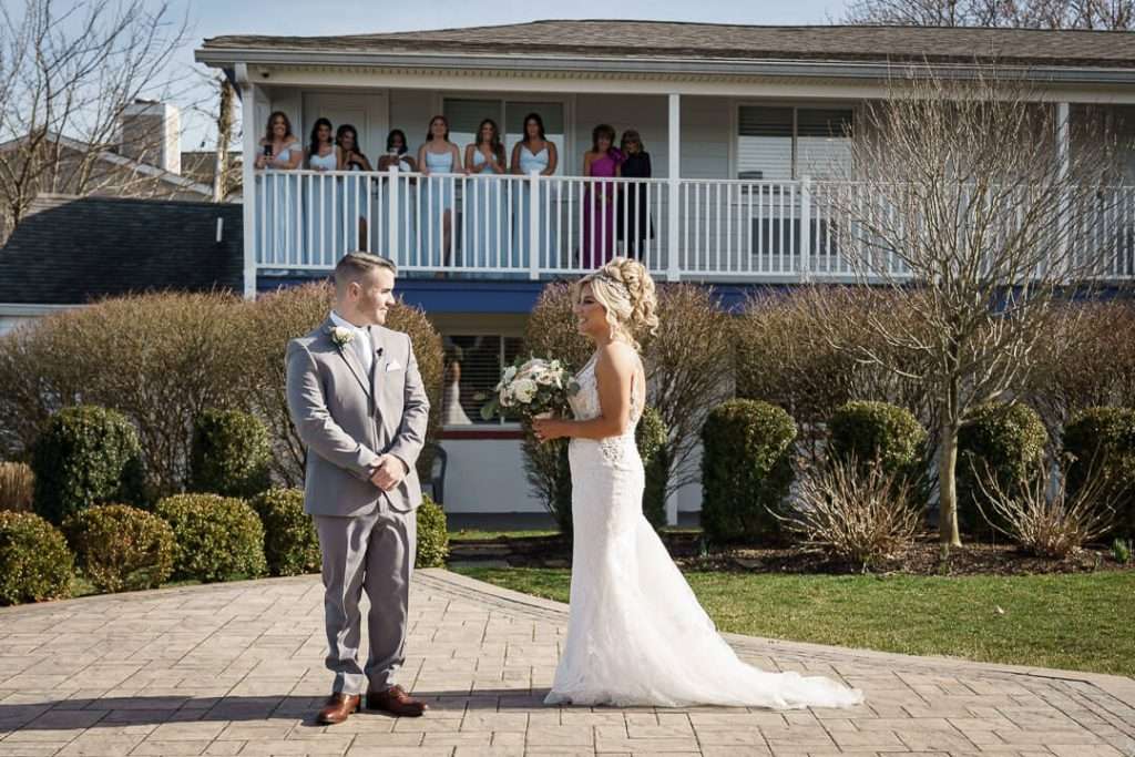 13- First-Look-Bride-Groom-Bridesmaids-Crystal-Point-Yacht-Club 