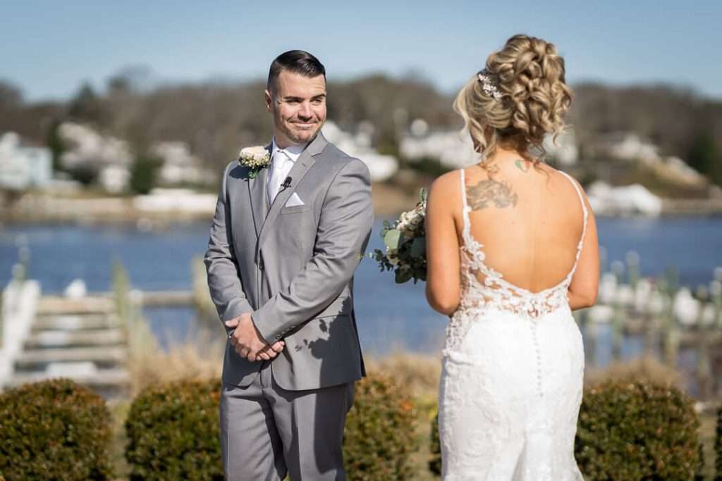 14-Crystal-Point-Yacht-Club-Groom-Seeing-Bride-First-Look-06477