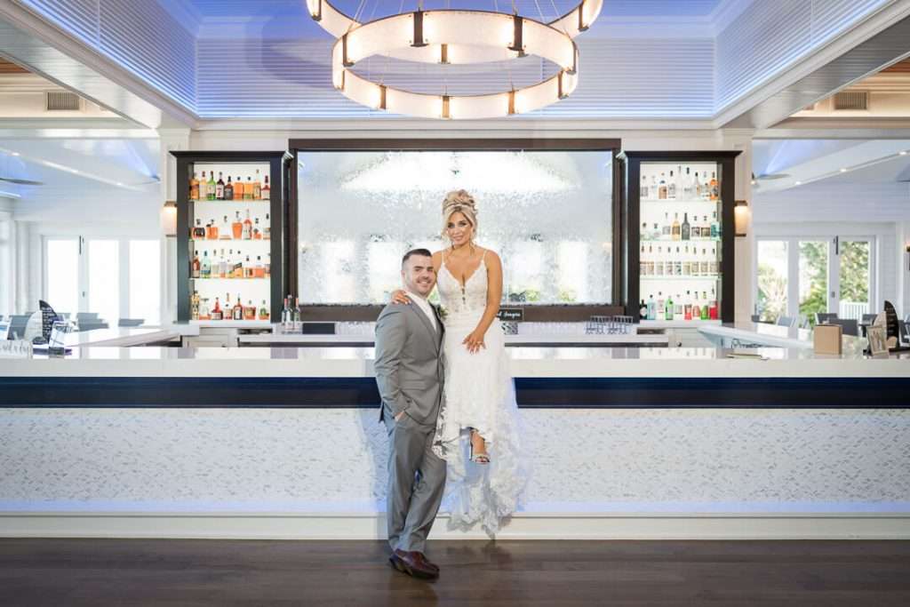 21_Bride_and_Groom_at_Bar_Crystal_Point_Yacht_Club