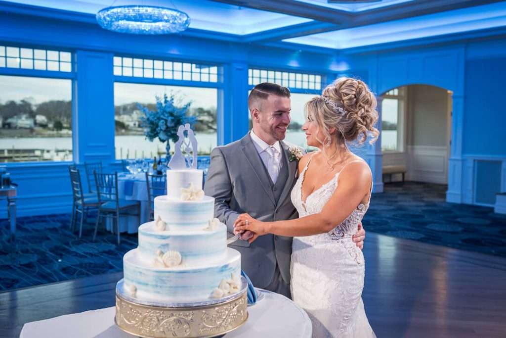 37-CrystalYachtClub-Wedding-Cake-Cutting-Moment