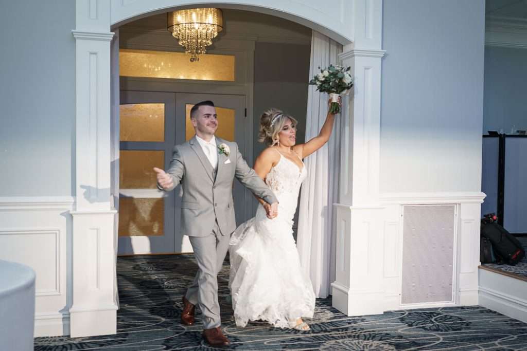 49- Bride-Groom-Reception-Entrance-Crystal-Point-Yacht-Club
