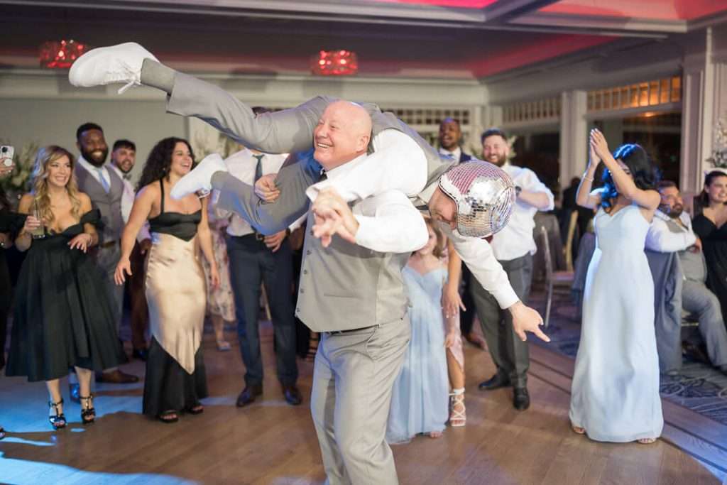61-CrystalYachtClub-Reception-Groom-Lifted-Party-Dance