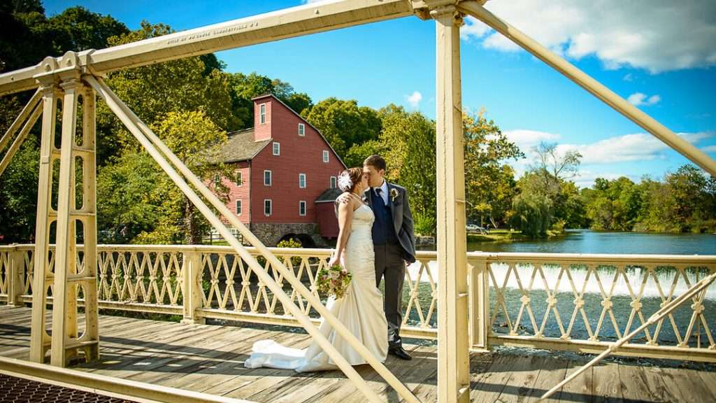 best-nj-wedding-photographer-couple-on-bridge