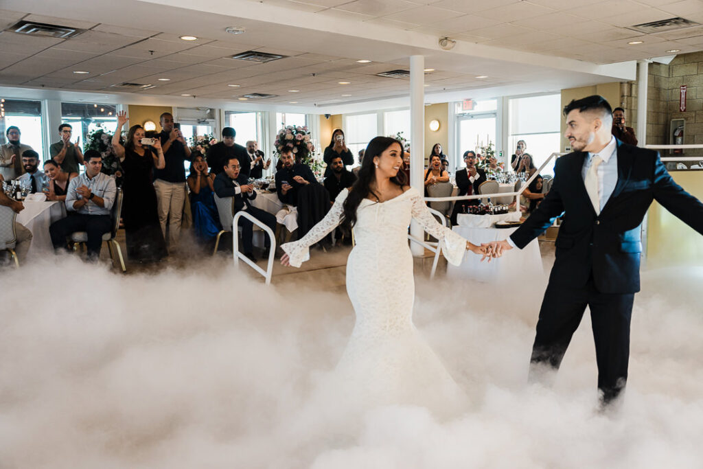 Bride and groom sharing their first dance surrounded by cloud effects at The Armory NJ Restaurant in Perth Amboy, photographed by Alex Kaplan Photography.
