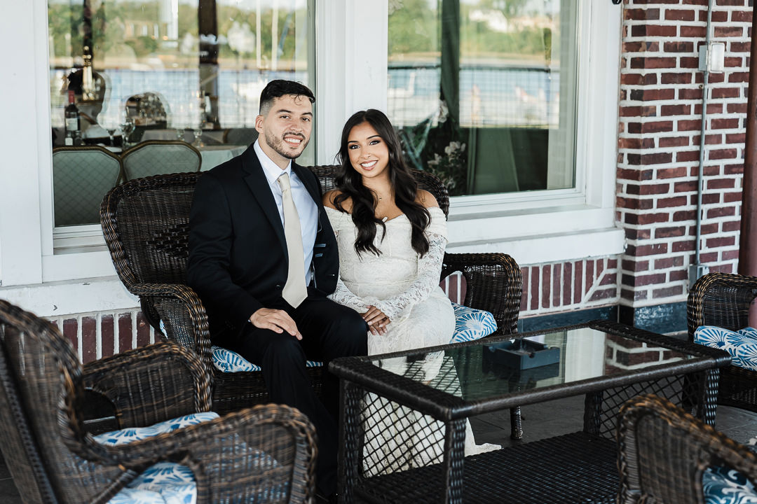 Engagement photographer in Perth Amboy NJ capturing a couple’s portraits on the outdoor terrace at The Armory