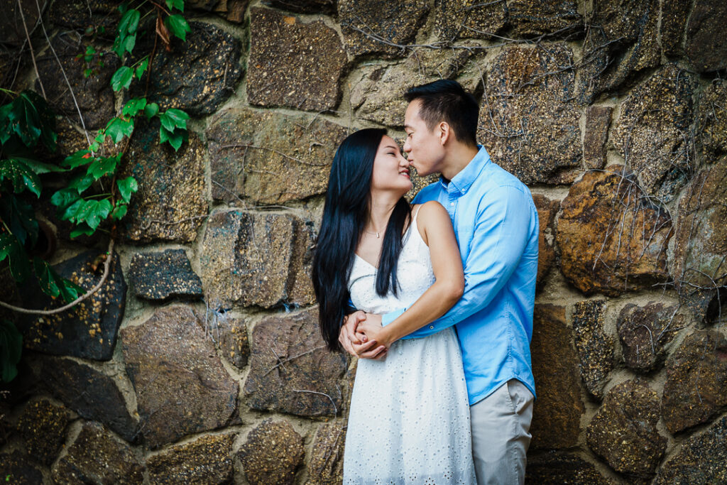 Artistic overhead engagement portrait on cobblestone path at Deep Cut Gardens Middletown
