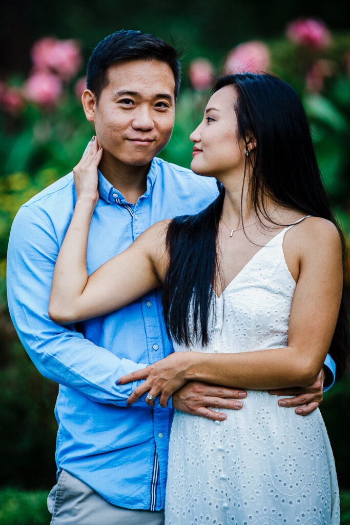 Natural engagement portraits at Deep Cut Gardens with lush greenery background