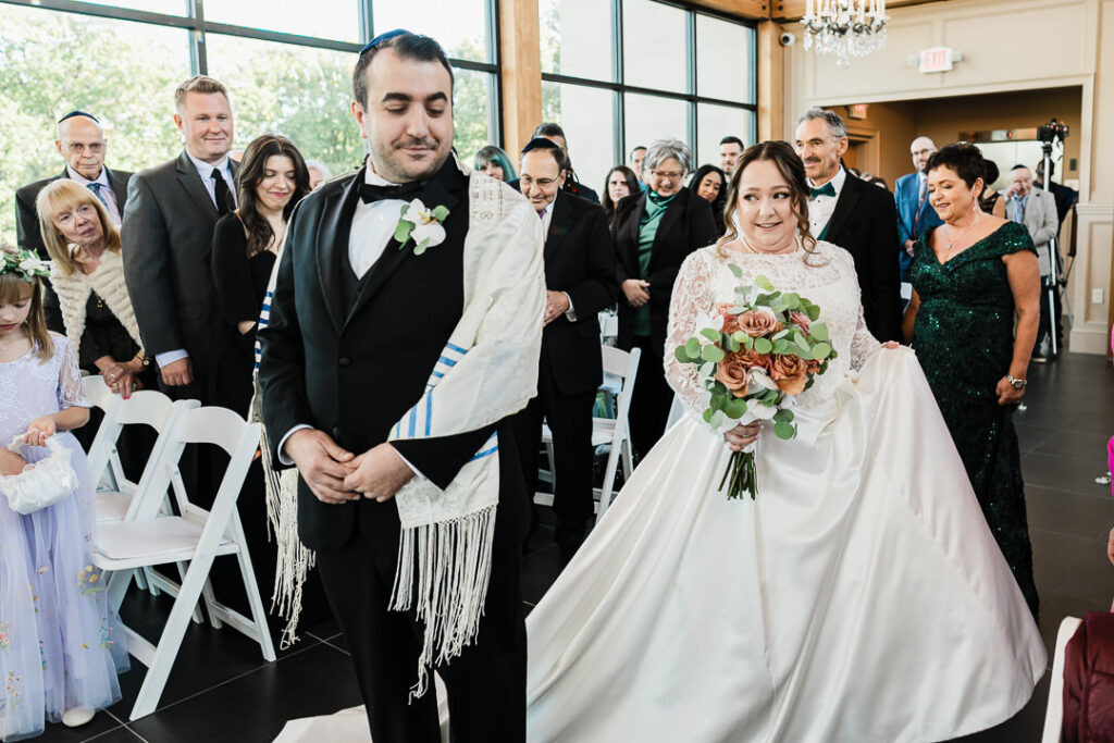 Bride and groom with young daughter in lavender dress at Lincoln Park