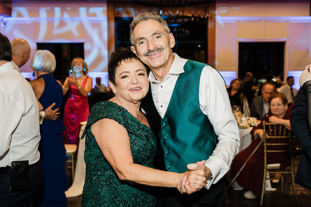 Parents dancing together at wedding reception at The View.