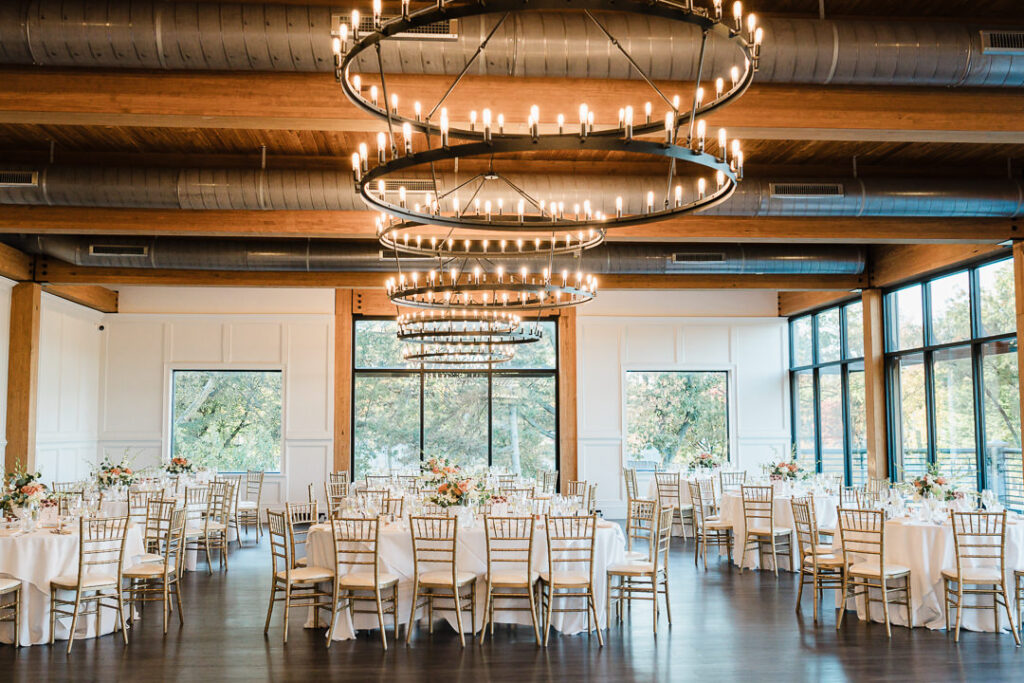 Wedding tablescape with coral rose and orchid centerpiece at The View.
