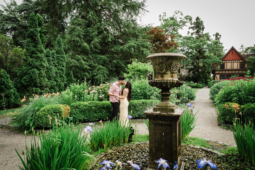 Alex Kaplan Photography creates dreamy engagement portrait with couple and ornate fountain at New Jersey garden estate