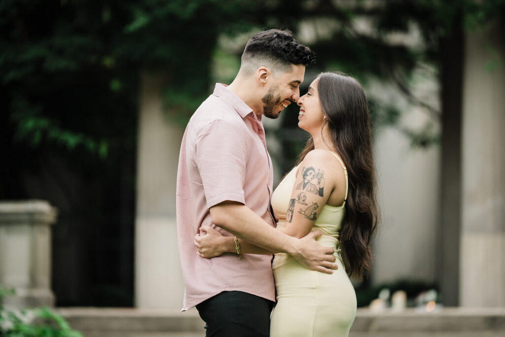 Alex Kaplan Northern New Jersey engagement photographer captures intimate embrace with classical architecture backdrop