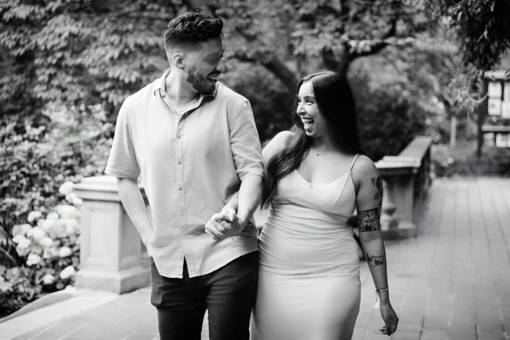 Alex Kaplan Northern NJ engagement photographer captures newly engaged couple laughing together in classic black and white portrait
