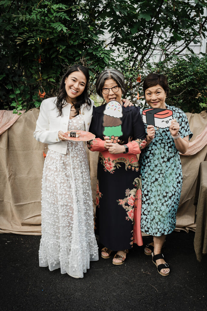 Bride with family members having fun at backyard wedding reception in NJ