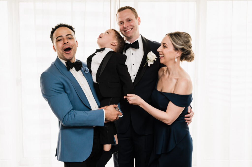 Groom Connor with sister Molly brother-in-law Erin and ring bearer nephew candid family photo by Alex Kaplan Photography