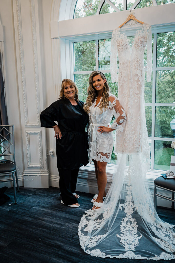 Bride and mother portrait with wedding dress at Legacy Castle by Alex Kaplan Photography