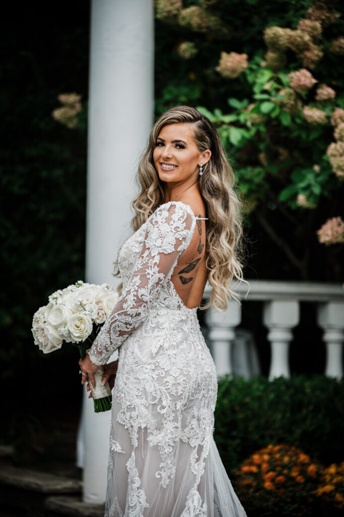 Bride portrait at Legacy Castle colonnade photographed by Alex Kaplan