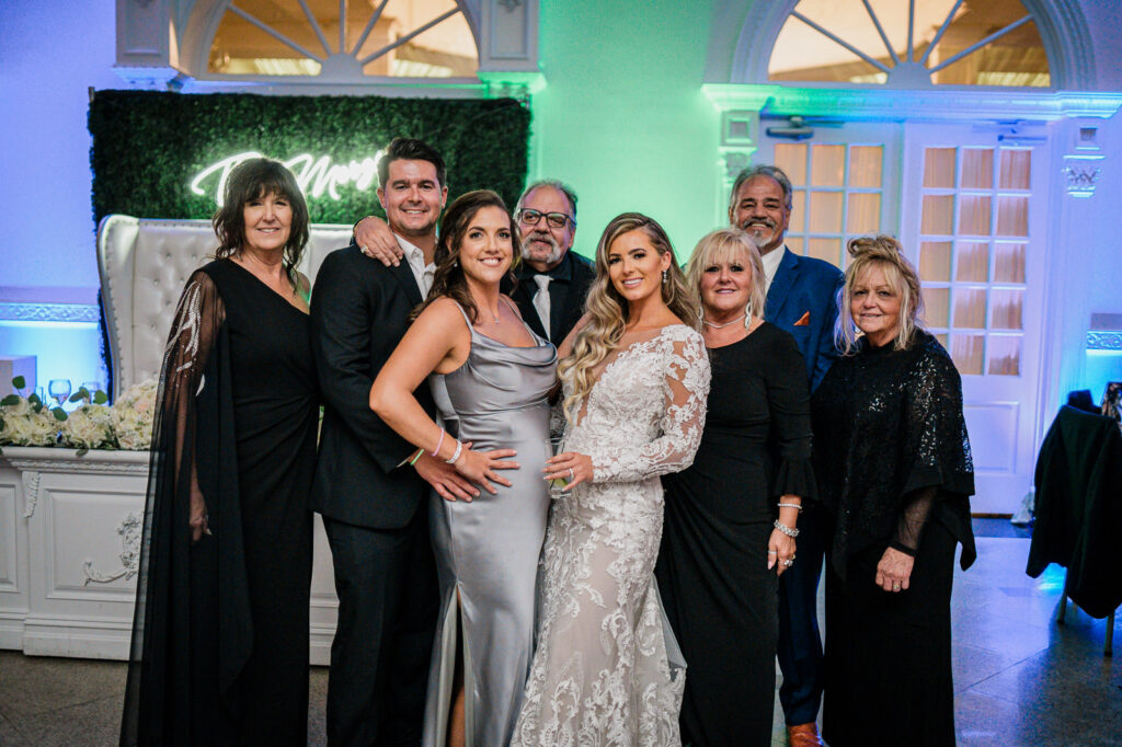 Extended family group portrait at Legacy Castle wedding by Alex Kaplan Photography