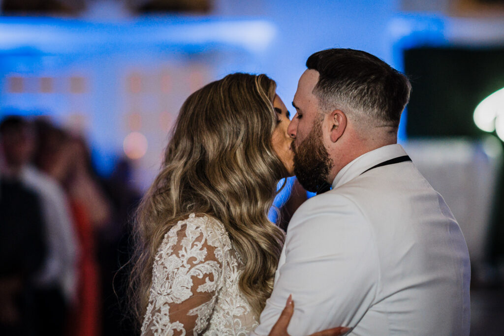 First dance in Legacy Castle ballroom with fog and blue lighting by Alex Kaplan Photography