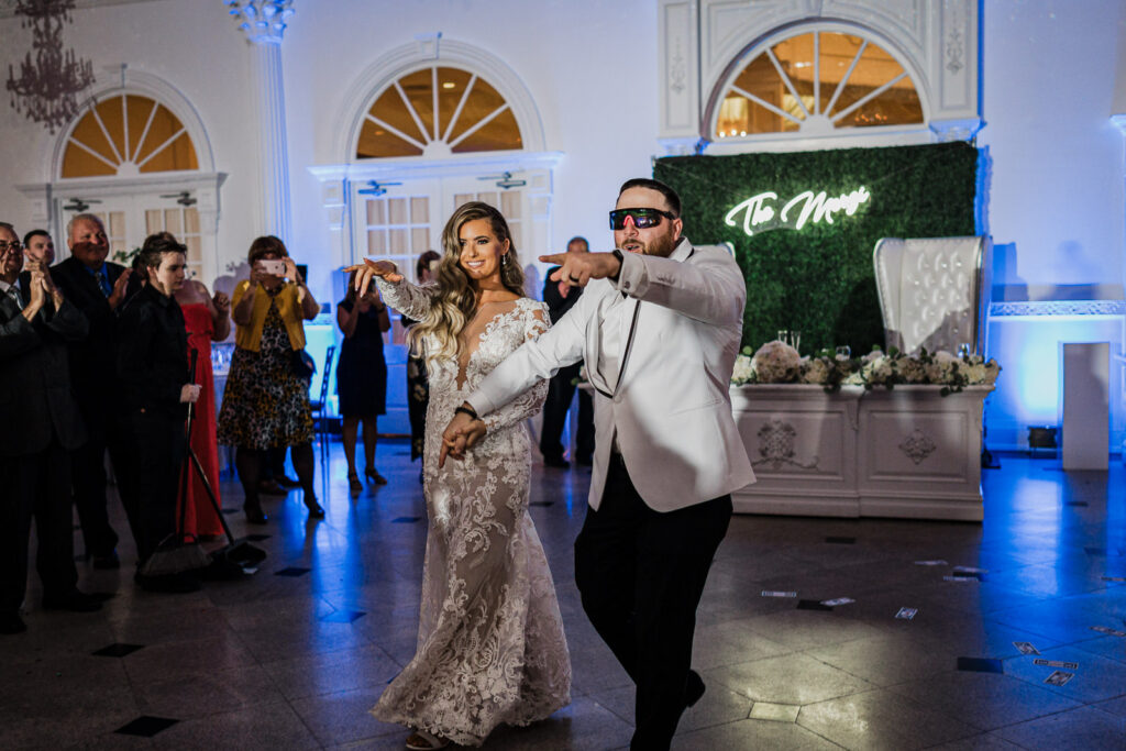 First dance with fog and chandelier lighting at Legacy Castle wedding by Alex Kaplan Photography