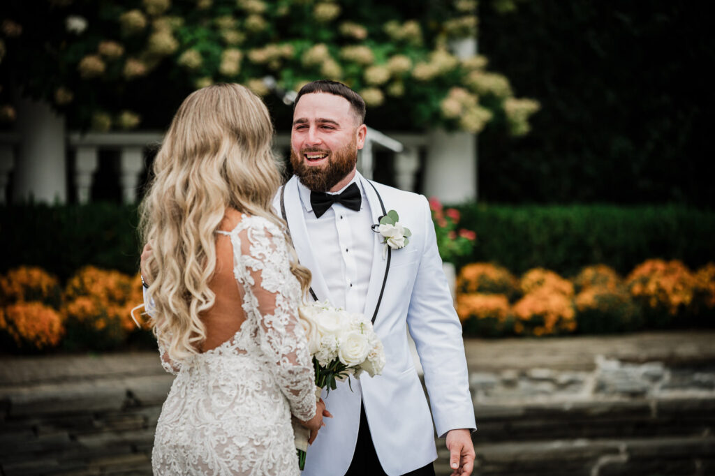 Happy couple after first look at Legacy Castle Pompton Plains by Alex Kaplan Photography