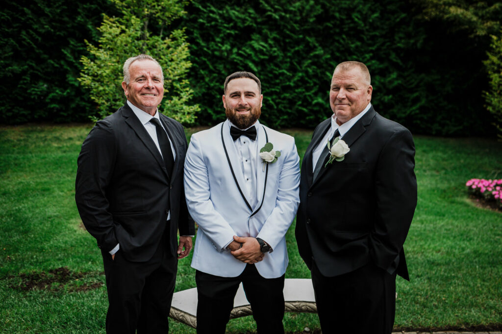 Groom with father and groomsmen at The Legacy Castle Pompton Plains by Alex Kaplan