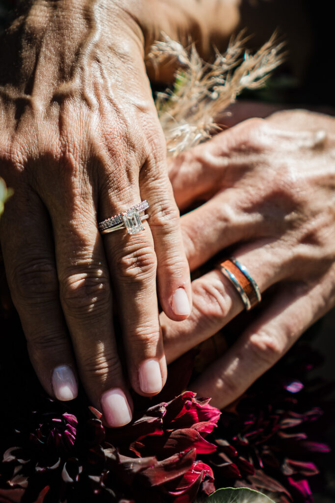 Wedding rings detail photo on fall bouquet at Mohawk House wedding in Sparta New Jersey by Alex Kaplan Photography