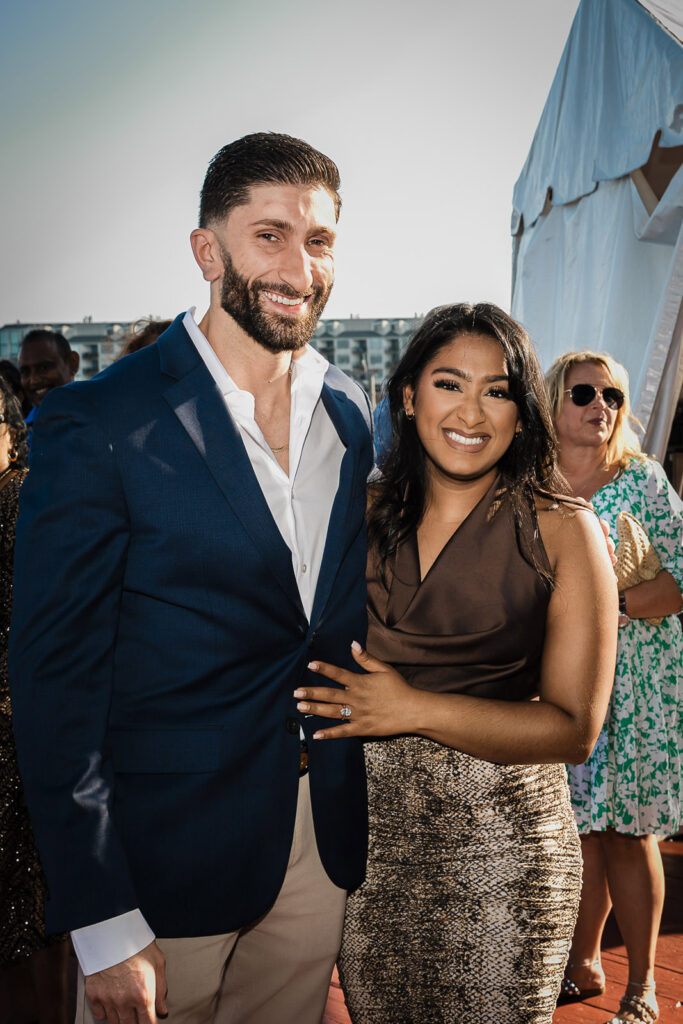 Newly engaged couple celebrates at Chart House Weehawken rooftop by Alex Kaplan Photography