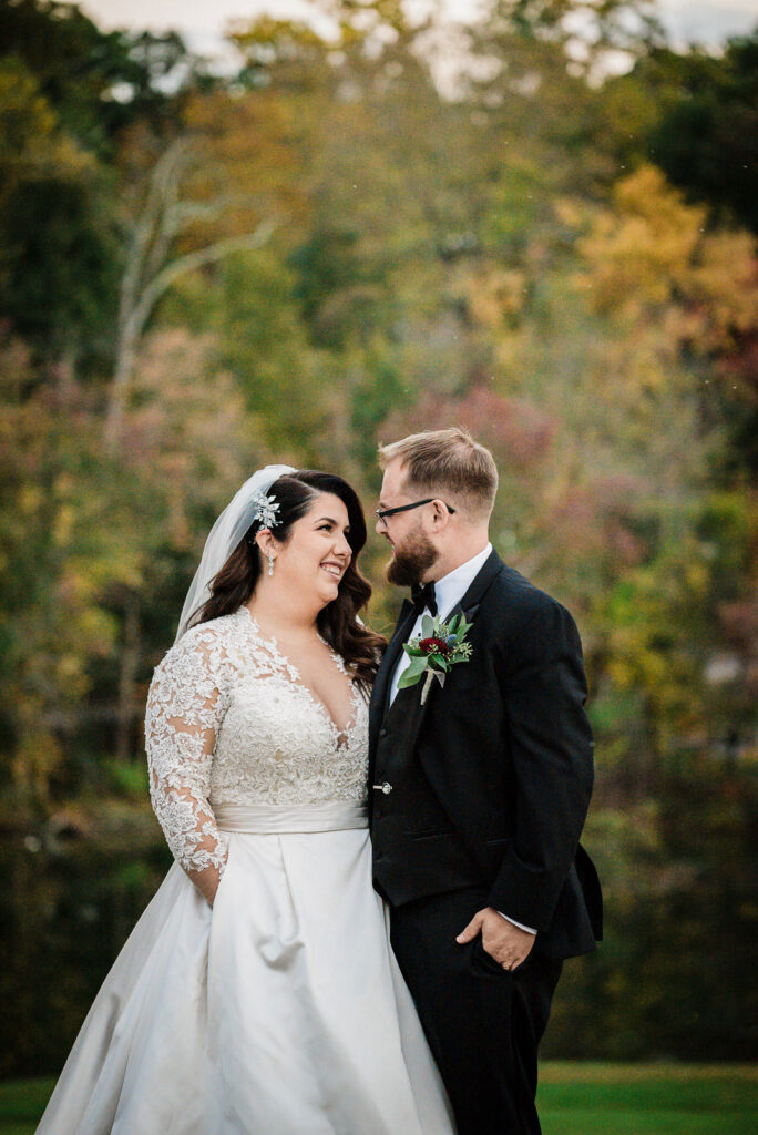 Bride and groom with dramatic sky and autumn colors Ramsey Country Club Alex Kaplan Photography