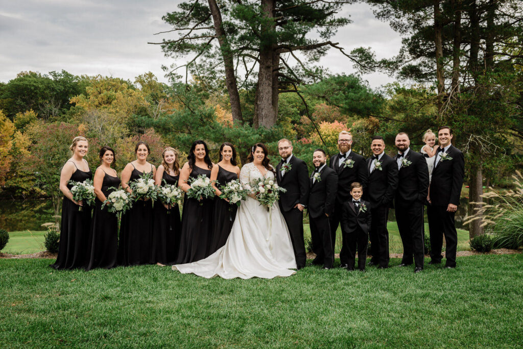 Complete wedding party portrait with bride groom bridesmaids and groomsmen at Ramsey Country Club by Alex Kaplan