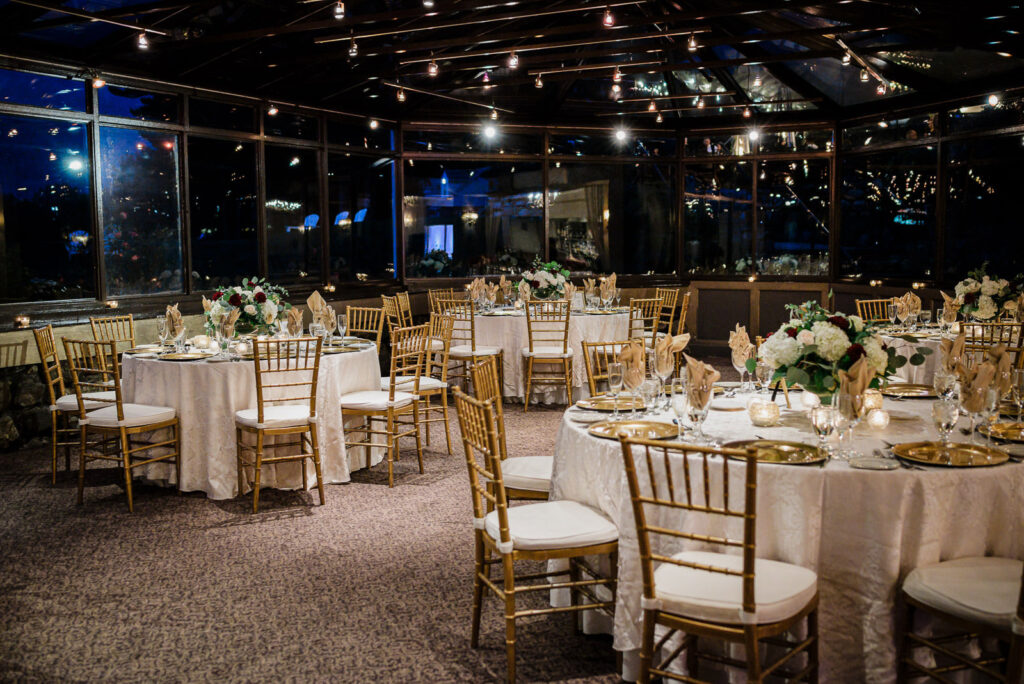 Newlyweds entering reception to cheering guests Ramsey Country Club by Alex Kaplan