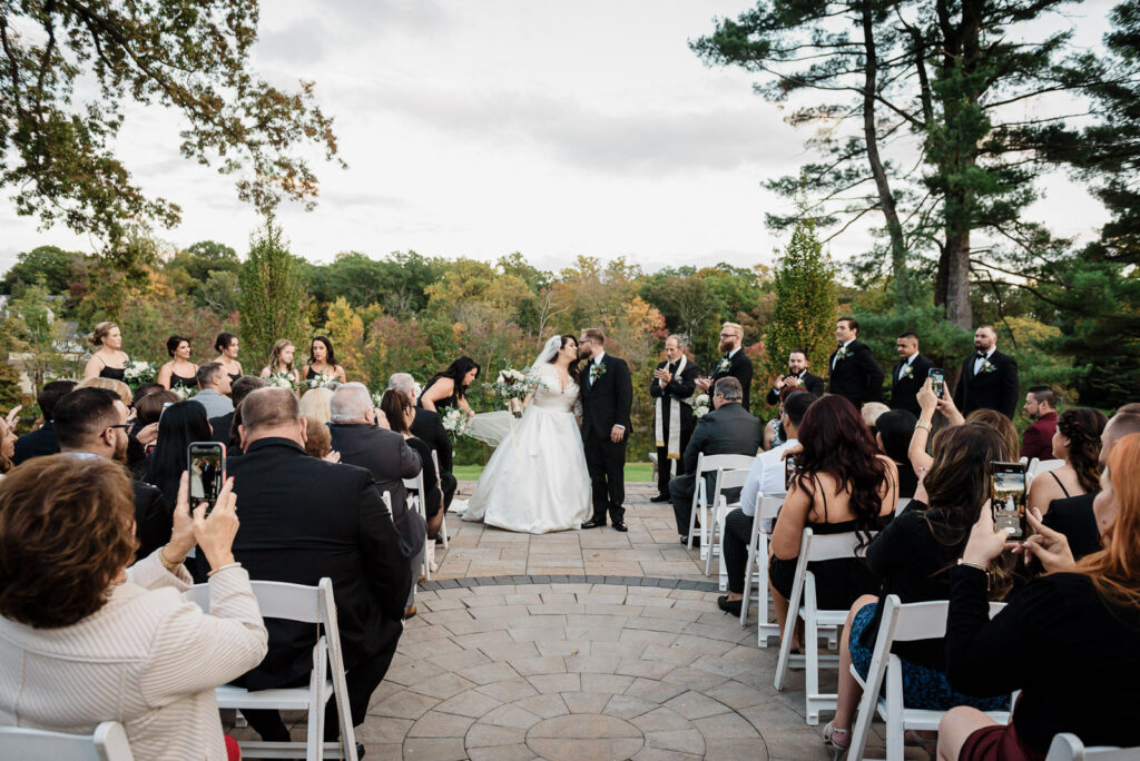 Just married couple celebrating after ceremony Ramsey Country Club fall wedding Alex Kaplan Photography