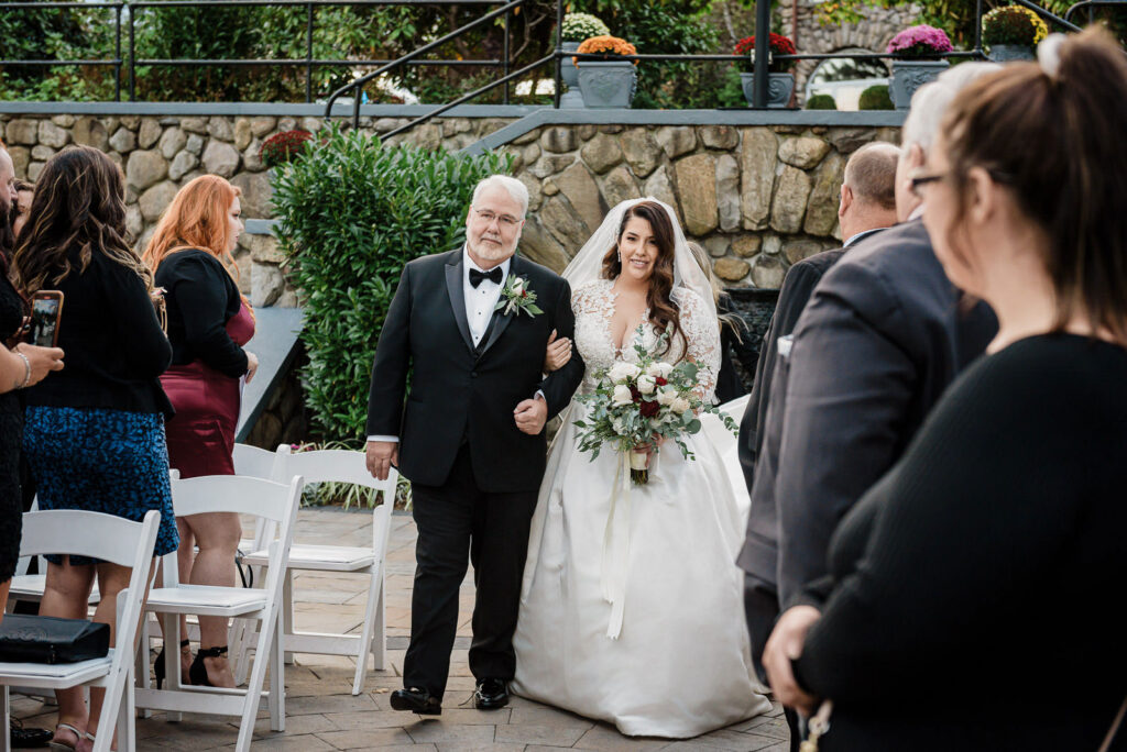 Father walking bride down aisle at Ramsey Country Club outdoor ceremony Alex Kaplan Photography