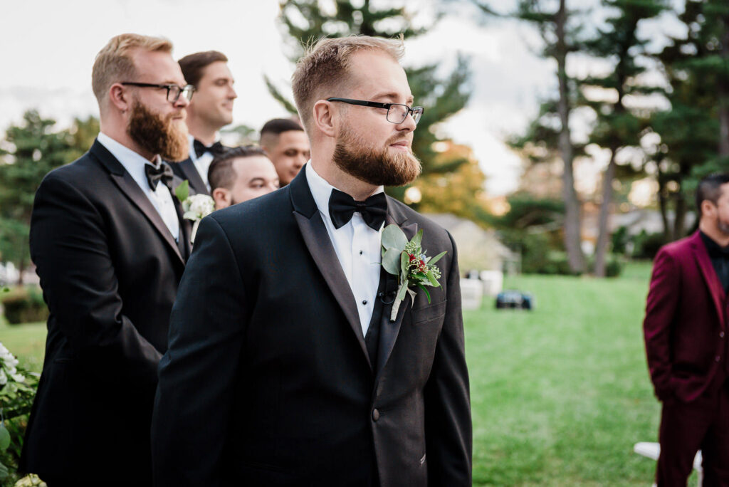 Newlyweds grand entrance into reception at Ramsey Country Club by Alex Kaplan Photography