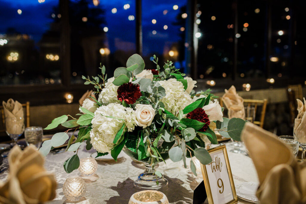 Reception ballroom with floor to ceiling windows evening lighting Ramsey Country Club by Alex Kaplan Photography