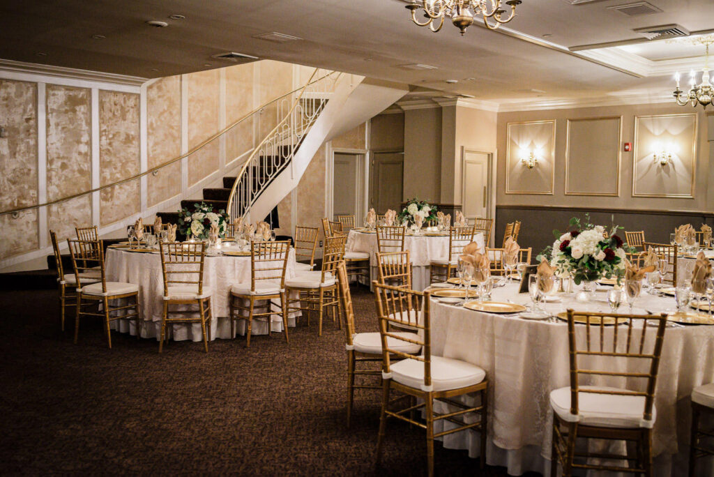 Reception table detail with gold and ivory color scheme Ramsey Country Club wedding by Alex Kaplan Photography