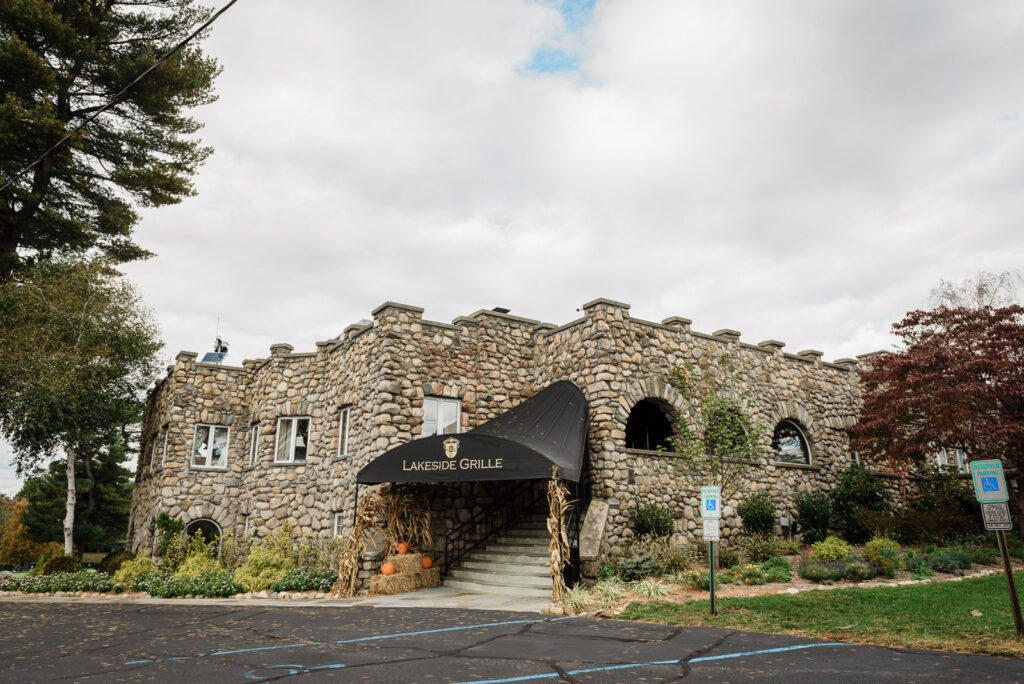 Ramsey Country Club Lakeside Grille historic stone building with fall foliage photographed by Alex Kaplan Photography