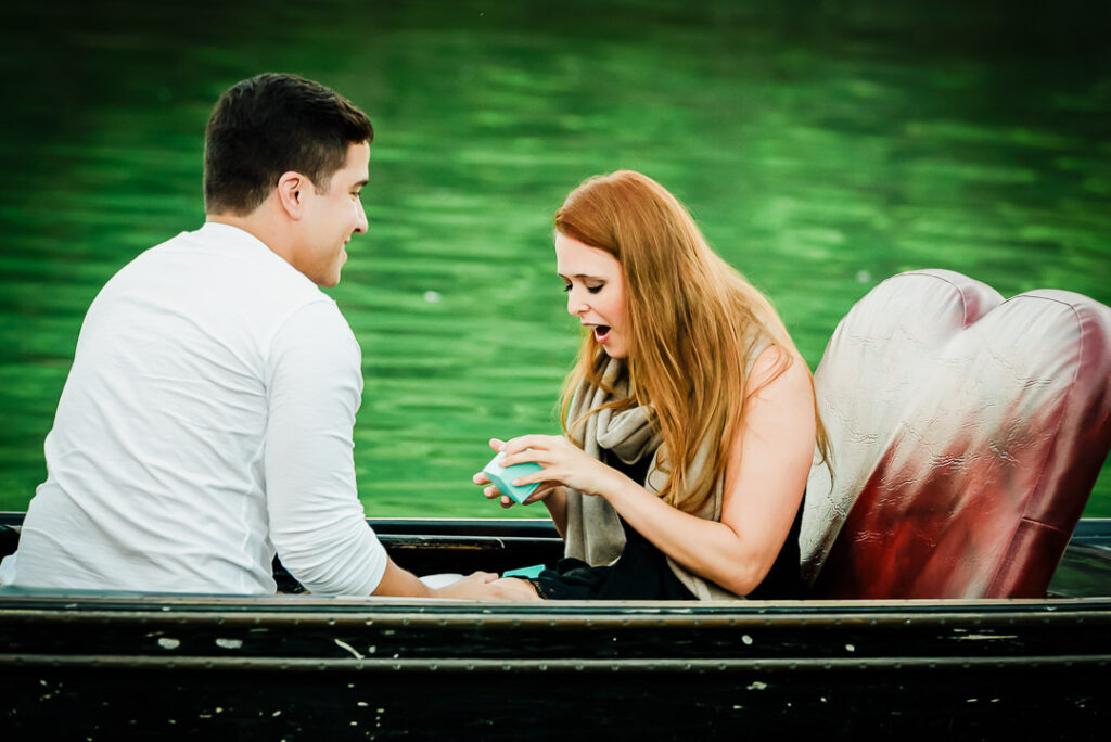 Emotional moment as bride sees engagement ring during surprise gondola proposal at Loeb Boathouse
