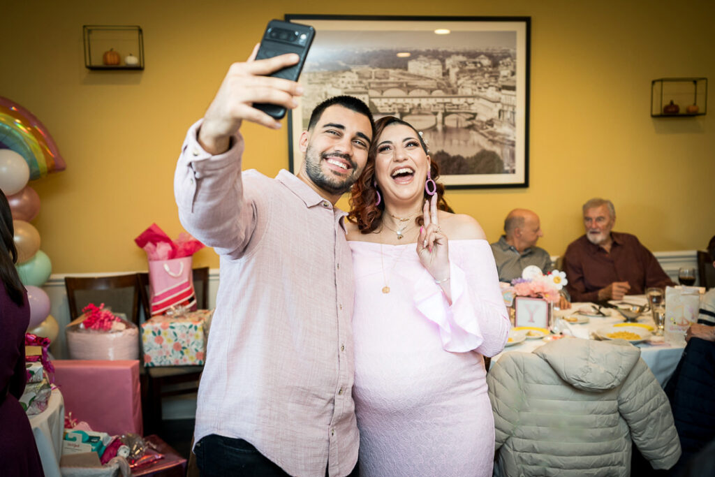 Women friends in purple and pink outfits celebrating at groovy baby shower Delpino NJ