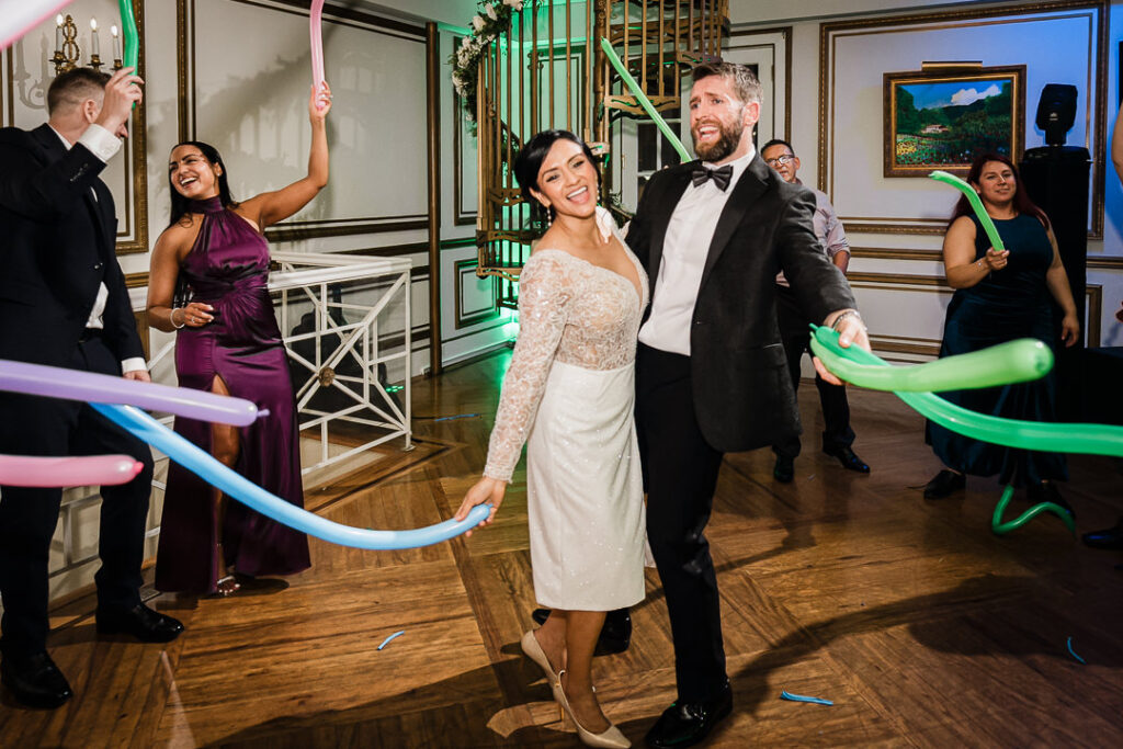 Energetic reception dance celebration with balloons at James Ward Mansion NJ wedding by Alex Kaplan Photography