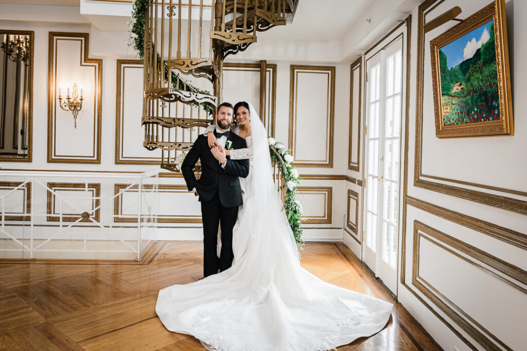Wedding couple portrait on James Ward Mansion spiral staircase in Westfield NJ by Alex Kaplan Photography