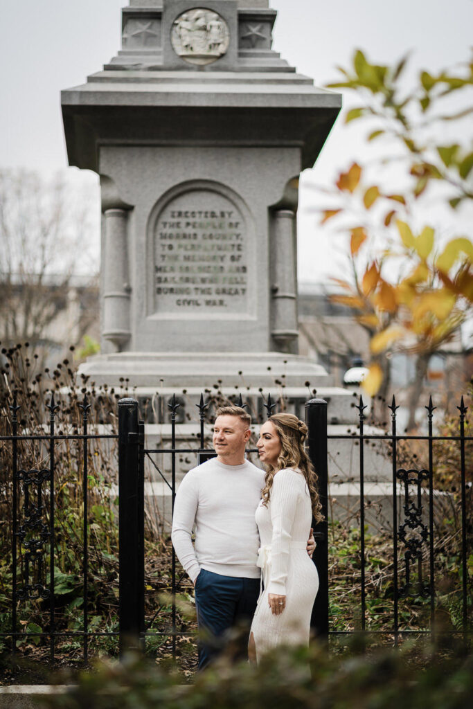 Romantic couple portrait at Morris County Civil War Monument during Morristown engagement photography session
