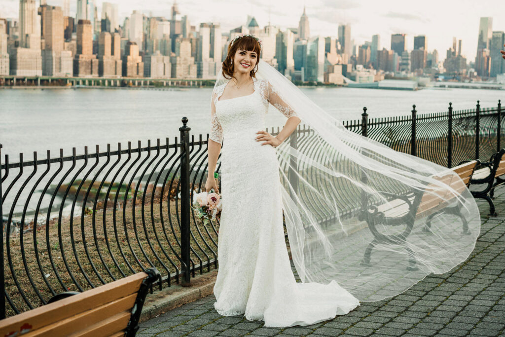 Weehawken New Jersey wedding portrait of bride with veil and NYC skyline by Alex Kaplan