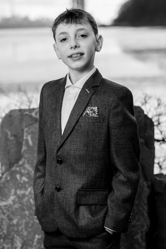 Black and white boy portrait with George Washington Bridge Fort Lee NJ